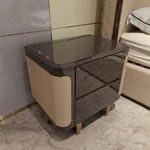 Dark Glossy Nightstand with Woven Leather Side Panels and Hidden Drawer Pulls